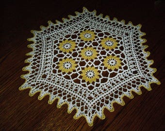 Handmade yellow and white hexagonal doily