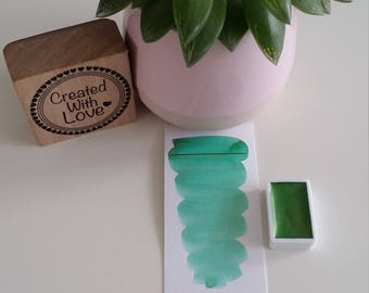 Handmade watercolor Patina Green (metallic) with a golden metallic glow