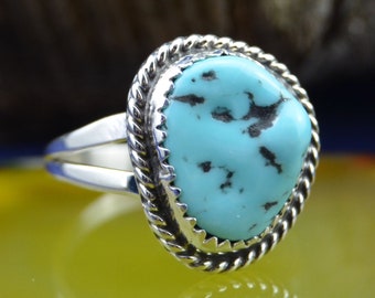 Sterling silver ladies ring with one free form white water turquoise stone size 7.5