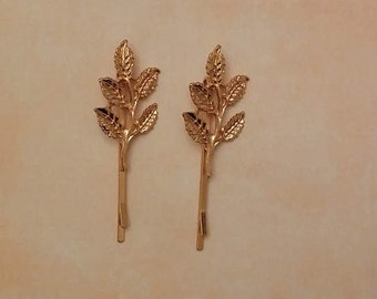 Forks with branches of golden leaves