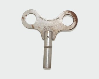 Old clock key, Made in Switzerland