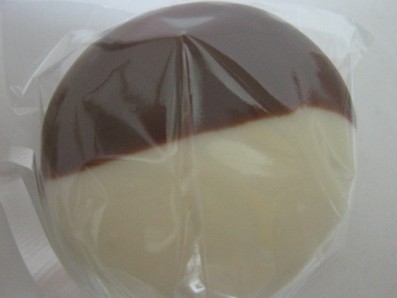 One dozen chocolate covered oreos with look of black and white cookies