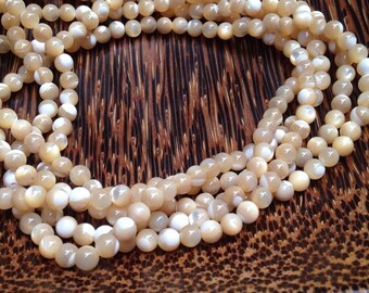 4mm Yellow Shell beads (G 416)