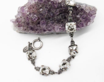 Catherine Popesco Vie La Parisienne retired silver tone Swarovski crystal signed bracelet