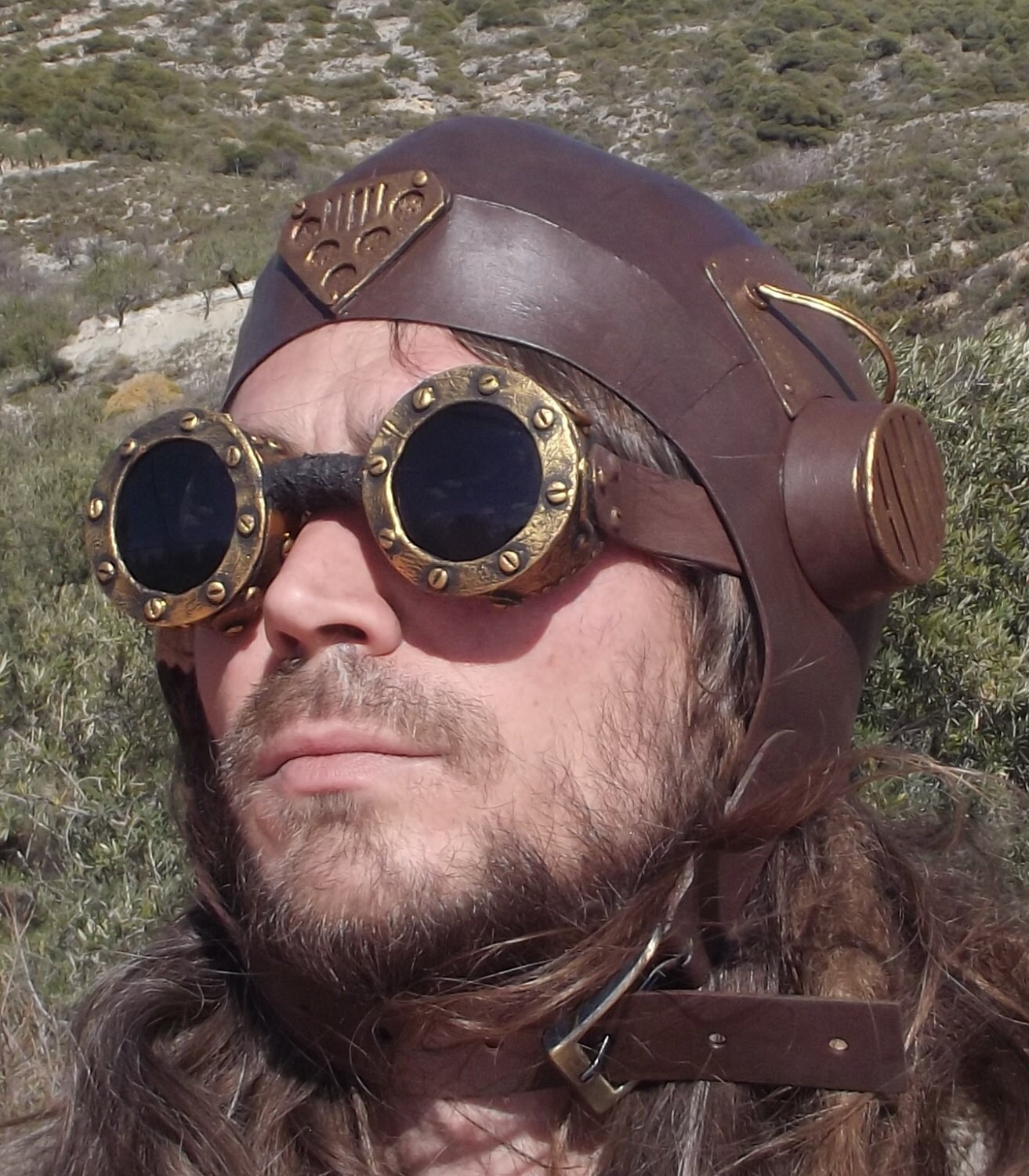 steampunk goggles and aviator hat