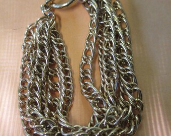 Vintage Gold toned mulitible 5 chain bracelet with toggle clasp no markings