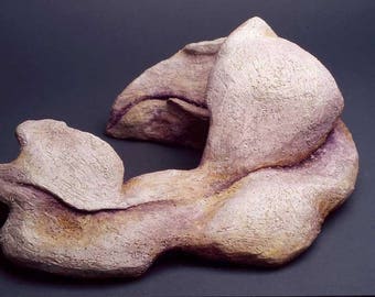 Abstracted woman curled up