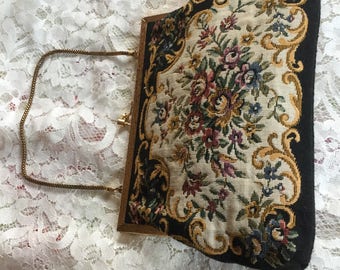Clutch purse is vintage tapestry purse