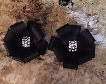 Black grain ribbon flower with rhinestone center