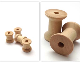 Light raw wood thread spools