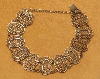 Lovely Vintage Art Deco era 800 silver filigree panel bracelet