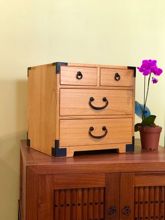 Japanese style jewelry box hand made with solid kiri wood.