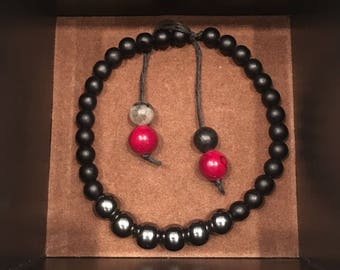 Black with red and grey accents
