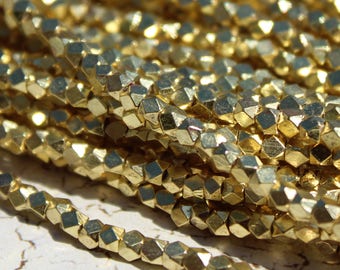 Gold Plated Metal Beads, Polygons with Diamond Facets from India - M-008