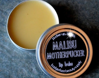 Malibu Rum. Malibu. Malibu Rum Lip Balm. .5 oz / 14 g. Rum & Coke Lip Balm. Natural Lip Balm. Funny Lip Balm. Beeswax Lip Balm.