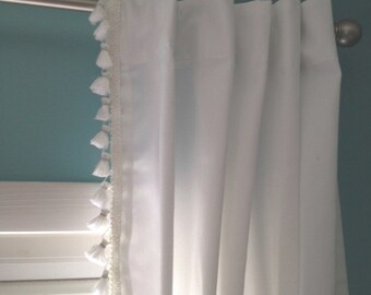 White curtain with French Tassel Trim and tiebacks