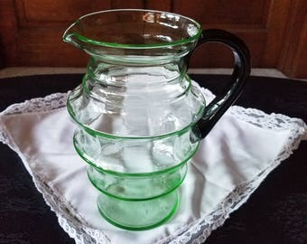 Weston Uranium Green Glass pitcher with black handle