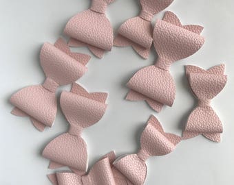 Leatherette pale pink bow