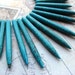 Graduate Turquoise Stick Beads