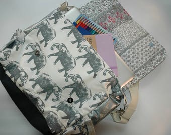 Messenger style bag with shoulder strap