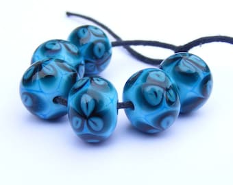 Teal flower bead set of 6 lampwork beads in turquoise, deep green and blue