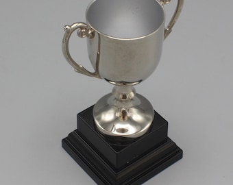 Silver Plated Small Trophy Award on Black Plastic Stand