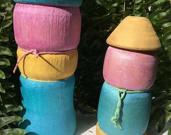 Garden gnomes- adorable and whimsical. Delightful pastel colors . Turned on a wood lathe .