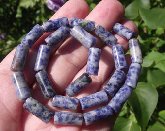 2 MULTICOLOR 14-15 X 6 MM BLUE SODALITE BEADS.