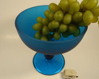 Blue glass pedestal bowl