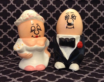 Vintage Kitschy egg head bride and groom salt and pepper shakers