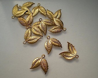12 tiny brass double leaf charms No. 1