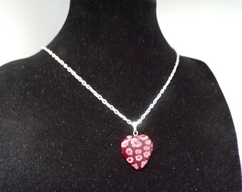 Featuring a floral heart pendant necklace