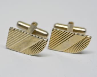 Gold tone cuff links