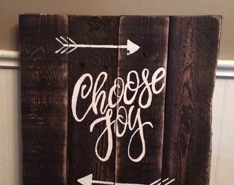 Rustic wood sign made from reclaimed wood