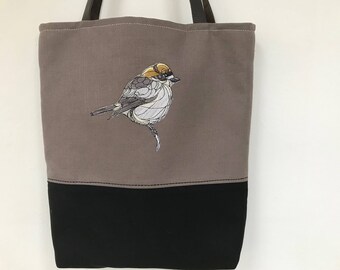 bag with leather handles