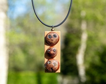 Three hazelnuts and a thin neck II
