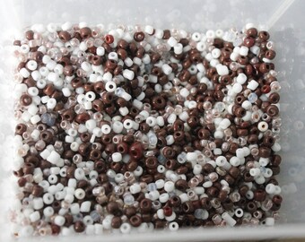 100g of Brown and white seed beads