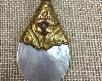 Mother of pearl brass pendant