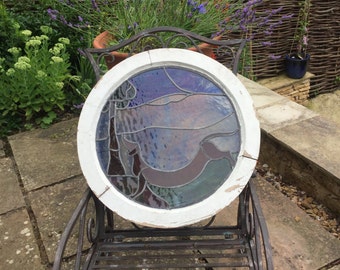 A Vintage Circular Stained Glass Window