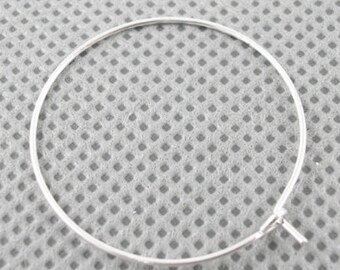 VERY pretty hoops in silver-plated brass (15 pair) 30