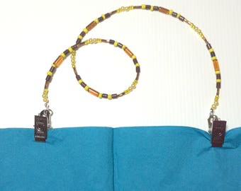 Beaded napkin serviette clip holder In brown and yellow tones