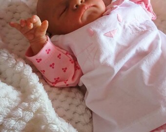 Reborn baby girl or boy asleep, Luxe by Cassie Brace. Very soft and flexible and realistic. Genesis paint. Original sculpt. Very lifelike.