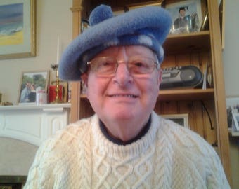 Tam O' Shanter with checked headband.