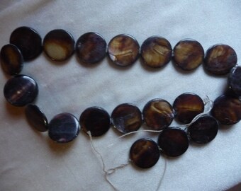 Beads, Dark Brown Mother of Pearl 20mm Flat Round Coin. Sold per 15 inch strand. There are 20 beads on the strand.