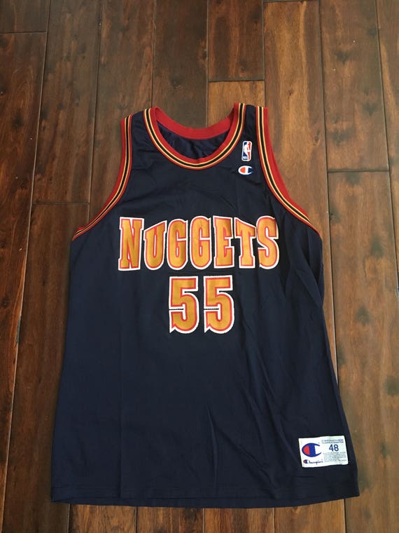 Vintage Dikembe Mutombo Champion Jersey