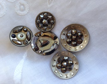 Cut steel buttons