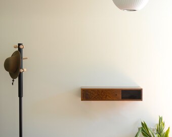 Floating hall table in walnut with handcut dovetailed drawers