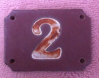 Red sandstone door number