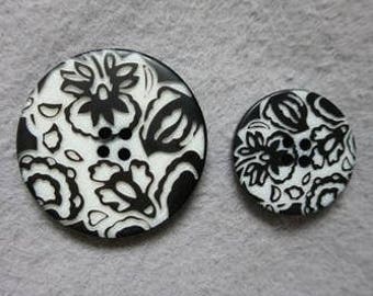 Black and white floral button
