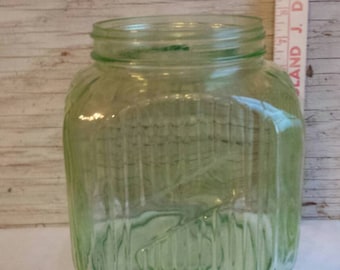 Vintage 30s or 40s 1 gallon green canister. No Mfg mark. 1 small flea bite on rim. No lid. A great gift idea. A Nice Display Piece.